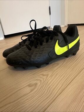 Nike Black Soccer Cleats with Neon Yellow Swoosh Accent